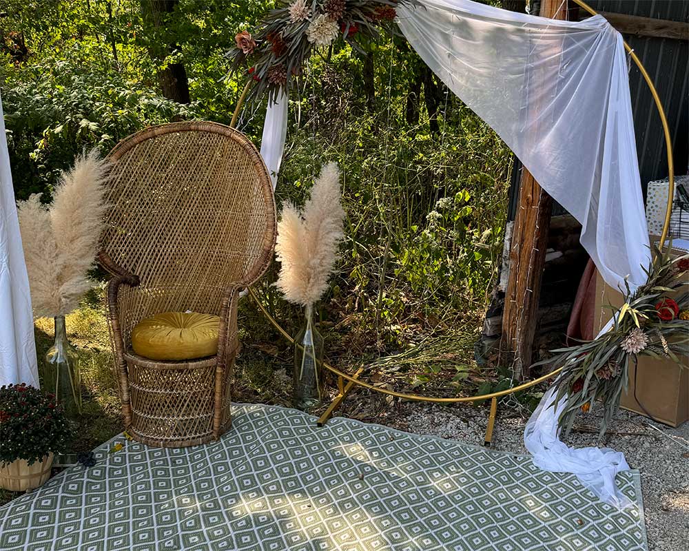 Large tent with window panels set up outdoors